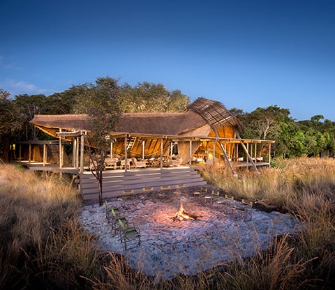 King Lewanika Lodge a view looking at the room with a campfire